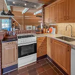 Three-bedroom With A Fireplace In Ferienhaus